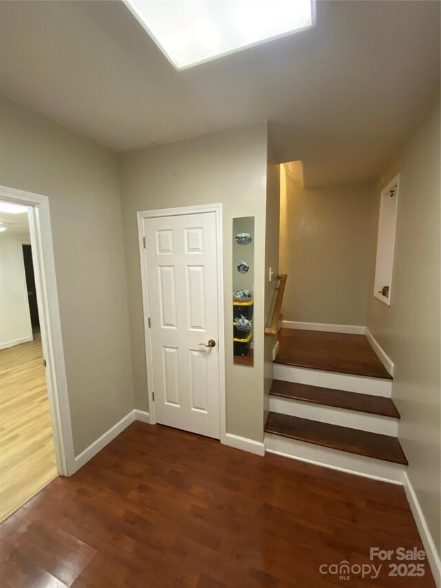 5570 George Henry Dr, Hickory, NC 28602 - staircase with wood finished floors and baseboards