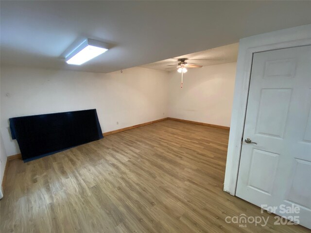 5570 George Henry Dr, Hickory, NC 28602 - bonus room with light wood finished floors and ceiling fan