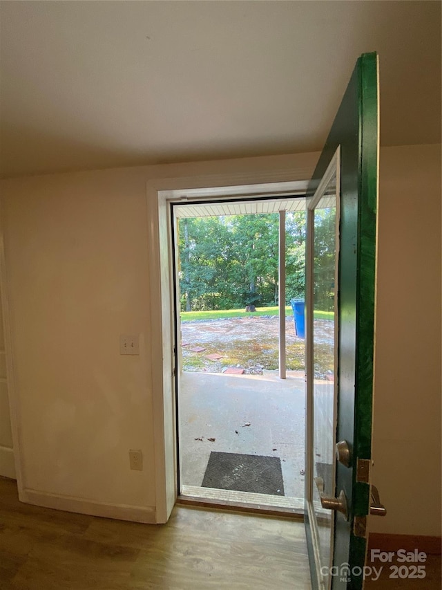 5570 George Henry Dr, Hickory, NC 28602 - doorway with wood finished floors and baseboards