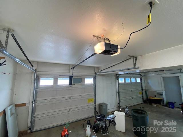 5570 George Henry Dr, Hickory, NC 28602 - garage featuring a garage door opener