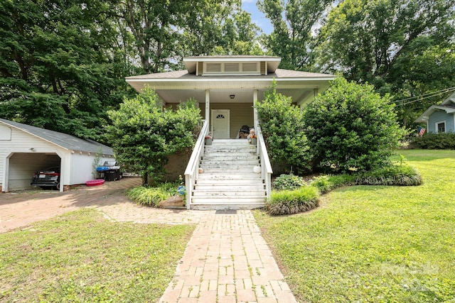816 Fulton St, Albemarle, NC 28001 - view of front facade featuring stairs, a front lawn, and covered porch
