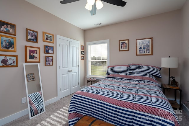 17438 Purser Dr, Locust, NC 28097 - bedroom with carpet flooring, a closet, and a ceiling fan