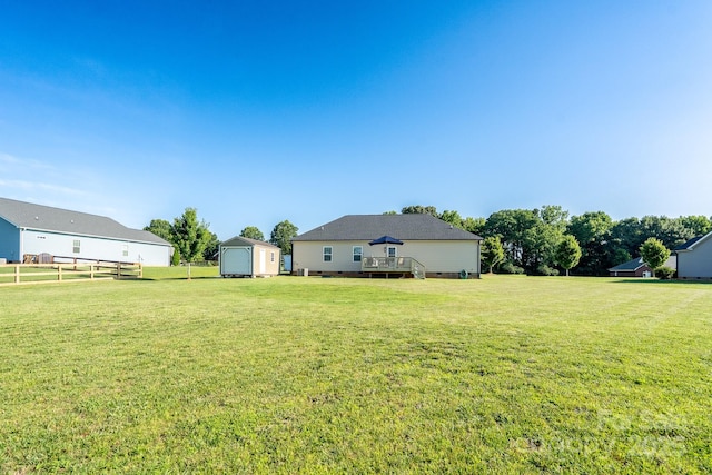 17438 Purser Dr, Locust, NC 28097 - view of yard with a storage shed and a deck