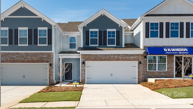 4238 Steel Way, Sherrills Ford, NC 28673 - craftsman-style home featuring an attached garage, stone siding, and driveway