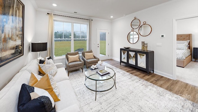4238 Steel Way, Sherrills Ford, NC 28673 - living room featuring wood finished floors, crown molding, recessed lighting, and baseboards