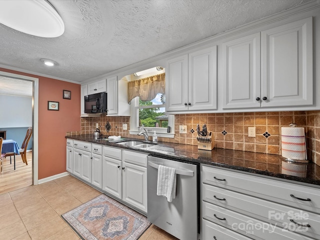 3509 Flint Dr, Statesville, NC 28677 - kitchen featuring stainless steel dishwasher, black microwave, white cabinets, dark stone counters, and ornamental molding
