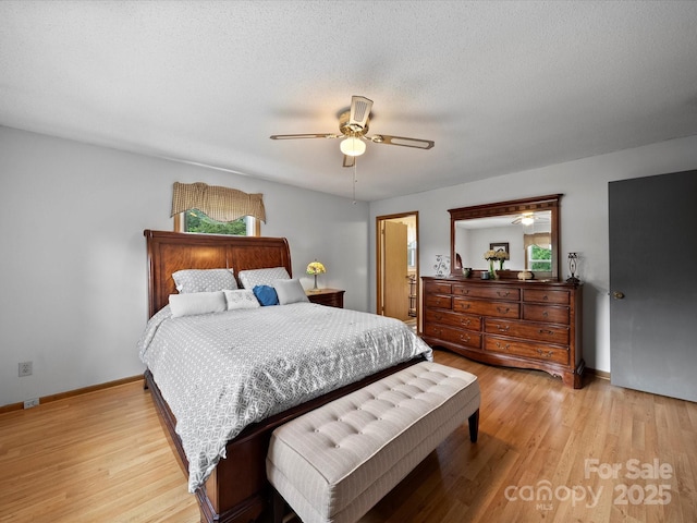 3509 Flint Dr, Statesville, NC 28677 - bedroom featuring light wood-type flooring, multiple windows, and ceiling fan