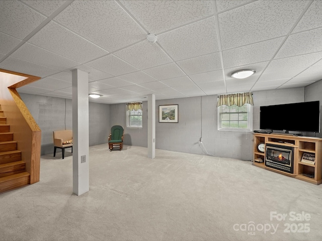 3509 Flint Dr, Statesville, NC 28677 - basement with a drop ceiling, plenty of natural light, concrete block wall, stairway, and carpet