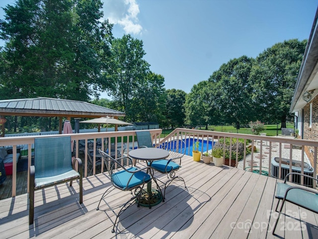3509 Flint Dr, Statesville, NC 28677 - deck with an outdoor pool and view of scattered trees
