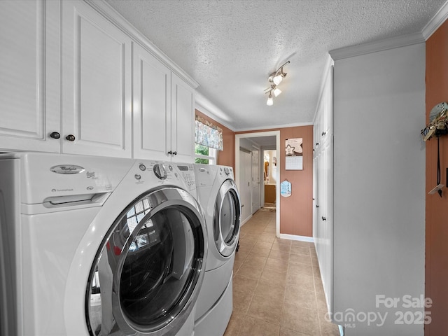 3509 Flint Dr, Statesville, NC 28677 - laundry area featuring separate washer and dryer, cabinet space, light tile patterned floors, ornamental molding, and a textured ceiling