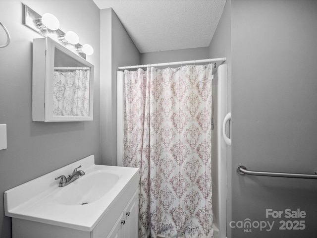 3509 Flint Dr, Statesville, NC 28677 - full bath with a textured ceiling, vanity, and a shower with shower curtain