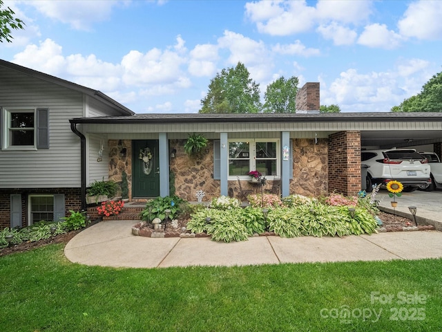 3509 Flint Dr, Statesville, NC 28677 - tri-level home with a chimney, stone siding, a carport, and concrete driveway