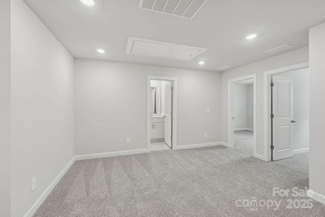 108 Ciara Pl Unit E, Mooresville, NC 28117 - unfurnished bedroom featuring attic access, carpet flooring, recessed lighting, and baseboards
