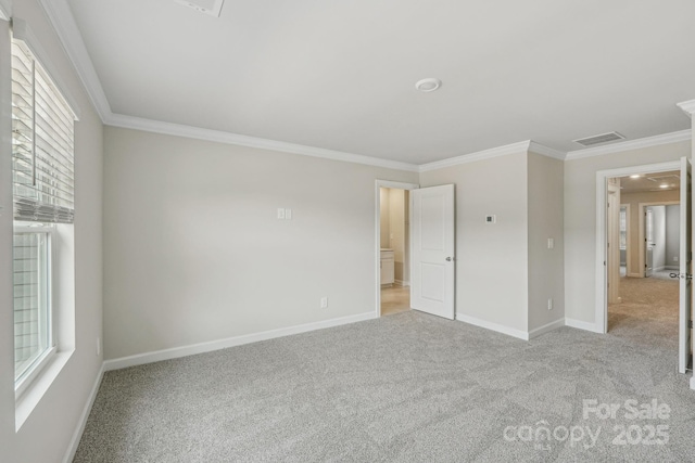 108 Ciara Pl Unit E, Mooresville, NC 28117 - unfurnished bedroom featuring crown molding, carpet floors, and baseboards
