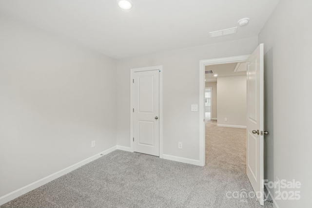 108 Ciara Pl Unit E, Mooresville, NC 28117 - unfurnished bedroom featuring carpet flooring, recessed lighting, and baseboards