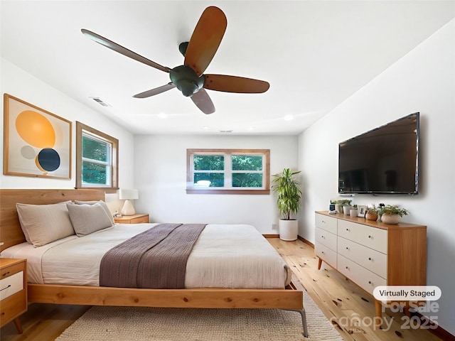 132 Windy Hill Rd, Statesville, NC 28625 - bedroom with multiple windows, light wood-type flooring, recessed lighting, and a ceiling fan