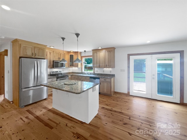 132 Windy Hill Rd, Statesville, NC 28625 - kitchen with stainless steel appliances, a sink, light wood-style floors, recessed lighting, and french doors