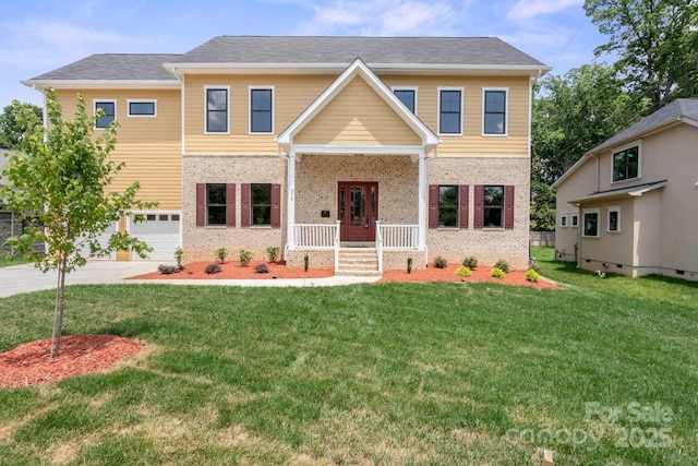 4015 Randolph Rd, Charlotte, NC 28211 - view of front of home with brick siding, a front lawn, driveway, and an attached garage