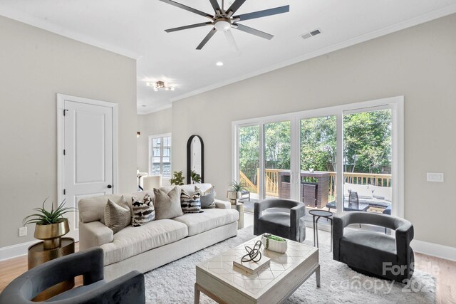 4015 Randolph Rd, Charlotte, NC 28211 - living area featuring light wood-type flooring, a ceiling fan, crown molding, and recessed lighting