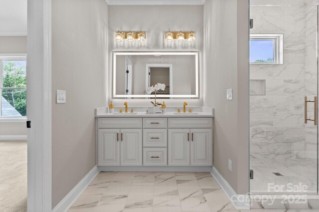 4015 Randolph Rd, Charlotte, NC 28211 - bathroom featuring double vanity, a stall shower, healthy amount of natural light, marble look tile flooring, and ornamental molding