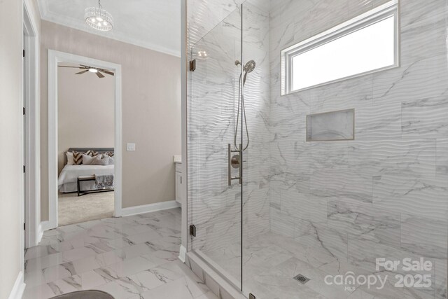 4015 Randolph Rd, Charlotte, NC 28211 - bathroom featuring a marble finish shower, ensuite bathroom, marble look tiles, and ornamental molding