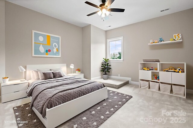 4015 Randolph Rd, Charlotte, NC 28211 - carpeted bedroom featuring baseboards and ceiling fan
