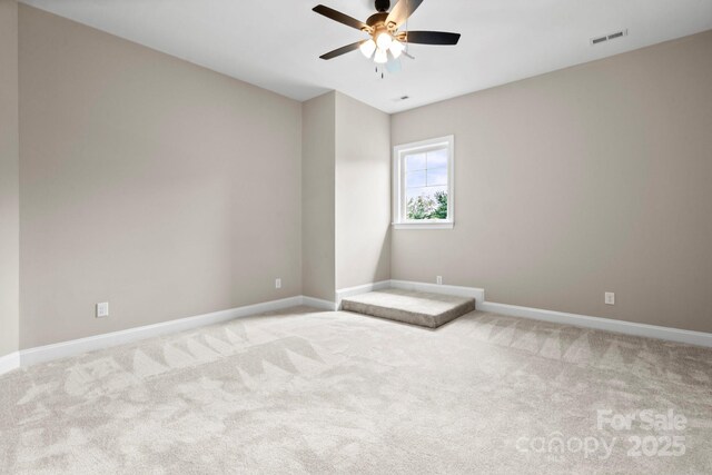 4015 Randolph Rd, Charlotte, NC 28211 - unfurnished room with a ceiling fan and carpet flooring