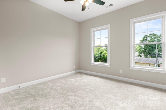 4015 Randolph Rd, Charlotte, NC 28211 - carpeted spare room with baseboards and ceiling fan