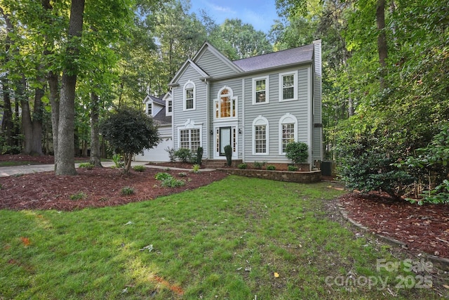 8805 Deerland Ct, Huntersville, NC 28078 - view of front facade featuring a chimney and a front lawn