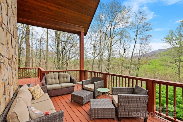 40 Ollis Ridge Ln, Elk Park, NC 28622 - wooden terrace with an outdoor living space and a forest view