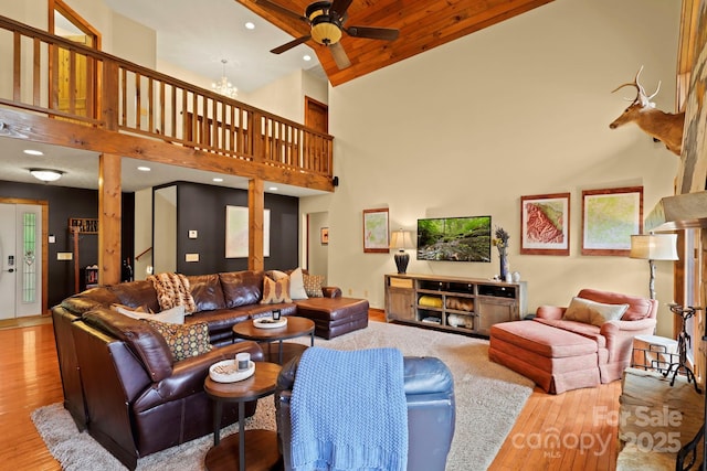 40 Ollis Ridge Ln, Elk Park, NC 28622 - living room featuring ceiling fan, high vaulted ceiling, wood finished floors, plenty of natural light, and recessed lighting