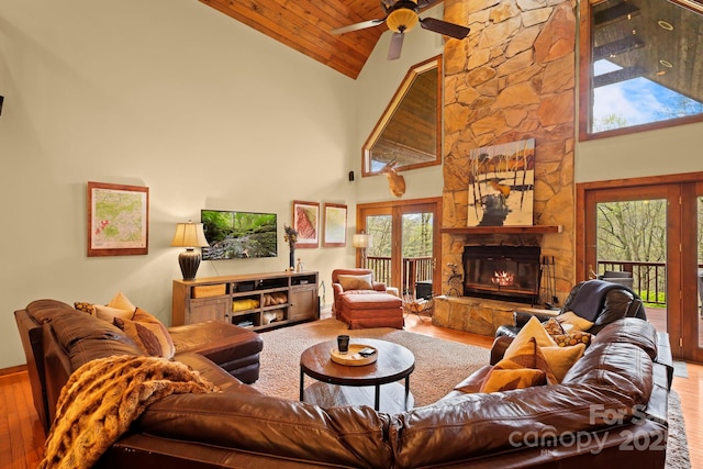 40 Ollis Ridge Ln, Elk Park, NC 28622 - living area with high vaulted ceiling, wood finished floors, ceiling fan, wooden ceiling, and healthy amount of natural light