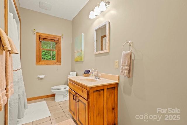 40 Ollis Ridge Ln, Elk Park, NC 28622 - bathroom with vanity, tile patterned floors, toilet, and baseboards