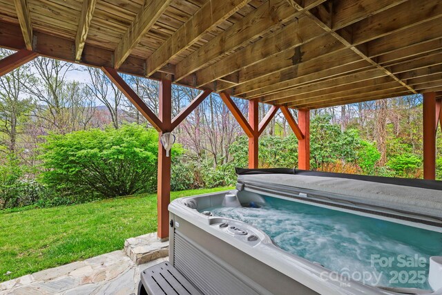40 Ollis Ridge Ln, Elk Park, NC 28622 - view of patio / terrace featuring a hot tub
