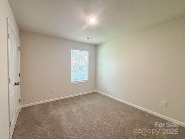 414 1st Ave SE, Hickory, NC 28602 - unfurnished room with carpet floors, baseboards, and recessed lighting