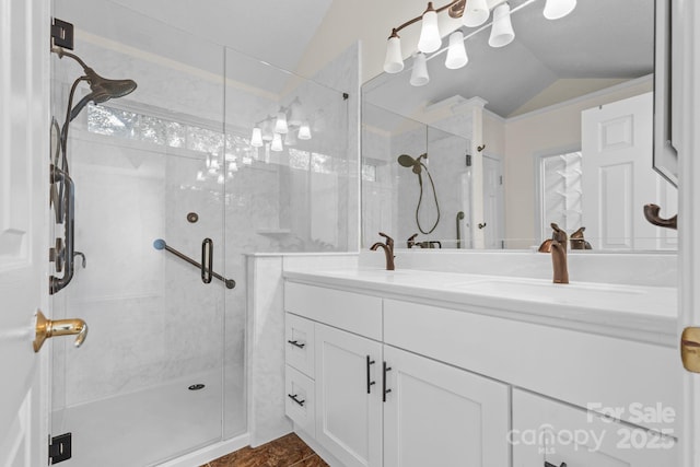 131 Canopy Ct, Mooresville, NC 28115 - bathroom featuring vaulted ceiling, a shower stall, and double vanity