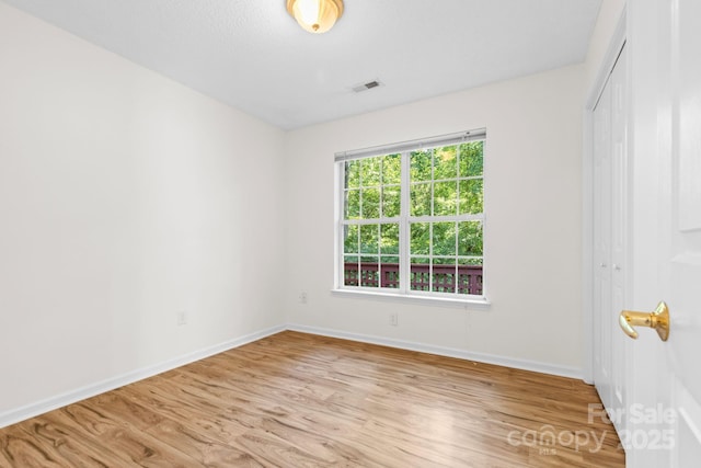 131 Canopy Ct, Mooresville, NC 28115 - unfurnished bedroom featuring light wood-style floors and a closet