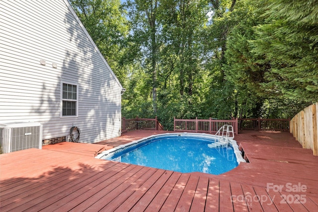 131 Canopy Ct, Mooresville, NC 28115 - view of pool with a deck and view of wooded area