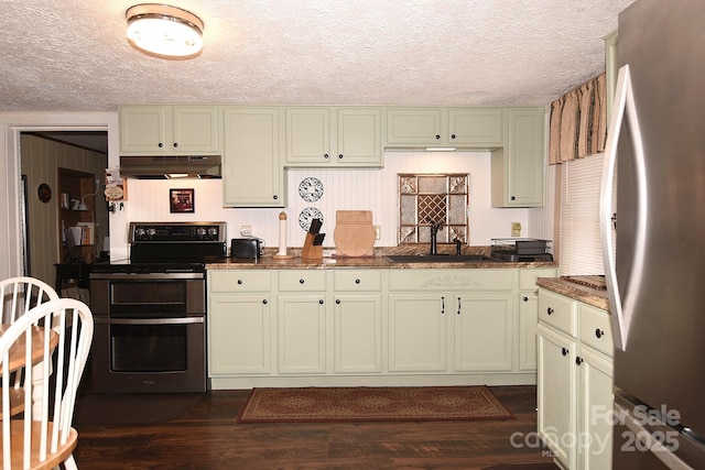 19 Mingus St, Canton, NC 28716 - kitchen featuring freestanding refrigerator, range with two ovens, under cabinet range hood, a textured ceiling, and dark wood-style floors