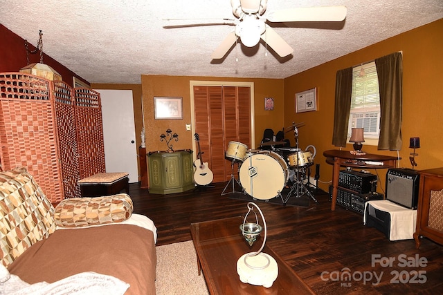 19 Mingus St, Canton, NC 28716 - living area featuring wood finished floors, a textured ceiling, ceiling fan, and cooling unit