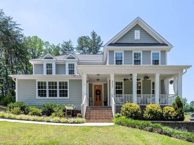 4237 Island Fox Ln, Denver, NC 28037 - view of front of property featuring covered porch, a ceiling fan, a shingled roof, and a front yard