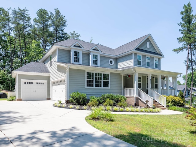 4237 Island Fox Ln, Denver, NC 28037 - view of front of property with covered porch, a garage, concrete driveway, a front lawn, and roof with shingles