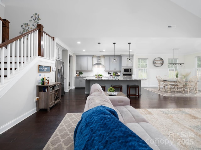 4237 Island Fox Ln, Denver, NC 28037 - living area with recessed lighting, dark wood finished floors, healthy amount of natural light, and crown molding