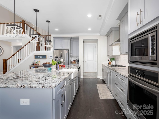4237 Island Fox Ln, Denver, NC 28037 - kitchen with stainless steel appliances, gray cabinets, decorative backsplash, light stone counters, and recessed lighting