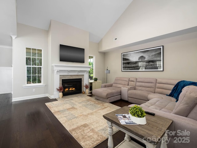 4237 Island Fox Ln, Denver, NC 28037 - living room featuring dark wood-style flooring, high vaulted ceiling, and a fireplace with flush hearth