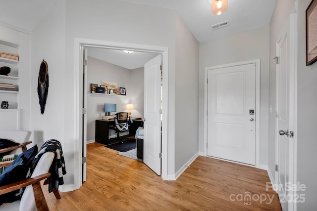1315 Elizabeth Ave, Kannapolis, NC 28083 - hallway with an office area and light wood finished floors