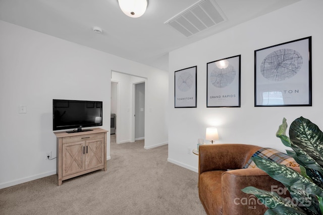 1315 Elizabeth Ave, Kannapolis, NC 28083 - living area featuring light carpet and baseboards
