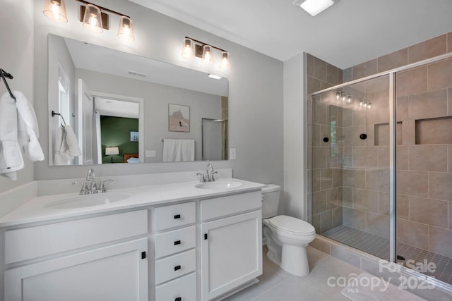 1315 Elizabeth Ave, Kannapolis, NC 28083 - full bath with double vanity, tile patterned floors, and a stall shower