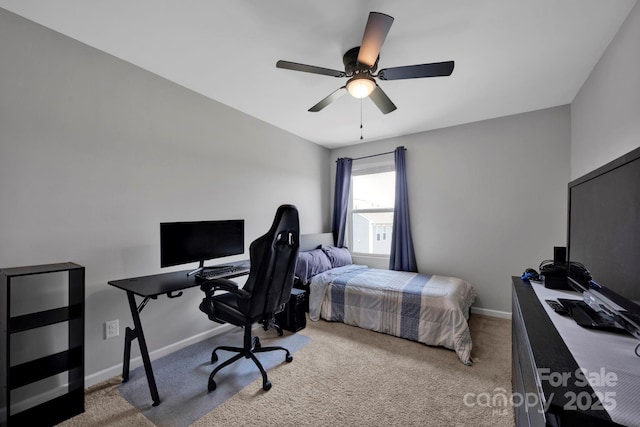 1315 Elizabeth Ave, Kannapolis, NC 28083 - carpeted bedroom featuring a desk and ceiling fan