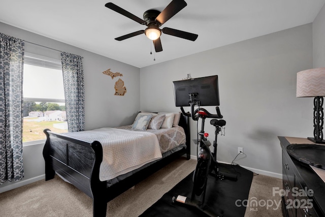 1315 Elizabeth Ave, Kannapolis, NC 28083 - carpeted bedroom with baseboards and a ceiling fan
